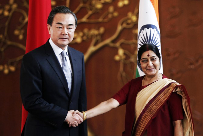 Chinese Foreign Minister Wang Yei with Indian counter part Sushma Swaraj. PHOTO: REUTERS