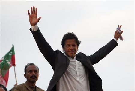 Imran Khan waves to his supporters. PHOTO: REUTERS