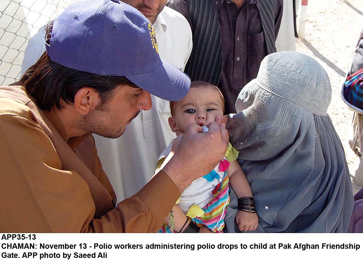A file photo of a helath worker vaccinating a child. PHOTO: APP