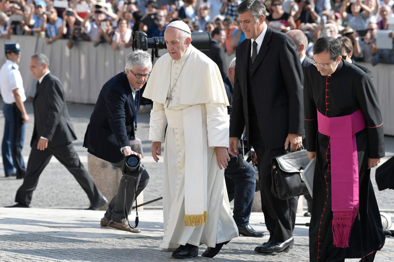 Pope Francis arrives at Saint Peter square to lead his weekly general audience on September 14, 2016 in the Vatican. PHOTO: AFP