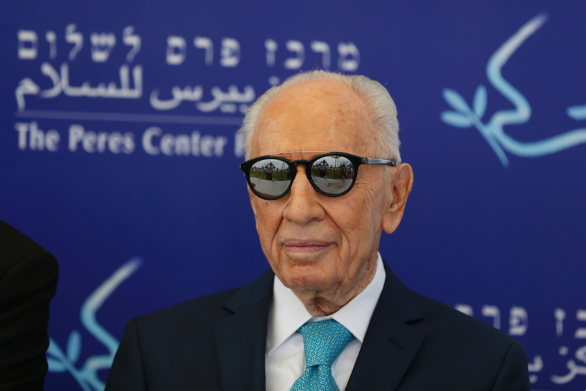 This file photo taken on May 9, 2016 shows former Israeli president Shimon Peres looking on during the opening of the "Mini World Cup for Peace" football event at the Herzlyia stadium, in the Israeli city of Herzlyia near Tel Aviv. PHOTO: AFP