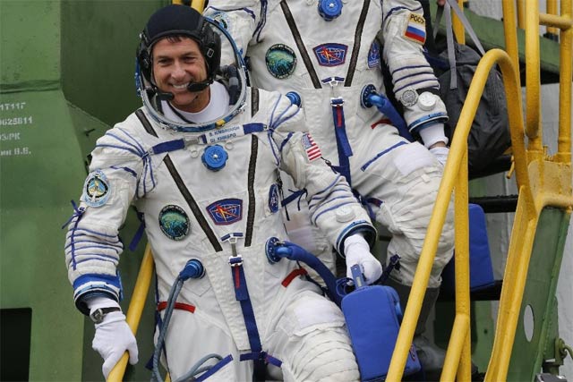 US astronaut Shane Kimbraugh, seen October 19, 2016, cast his vote for president by electronic ballot aboard the International Space Station. PHOTO: AFP