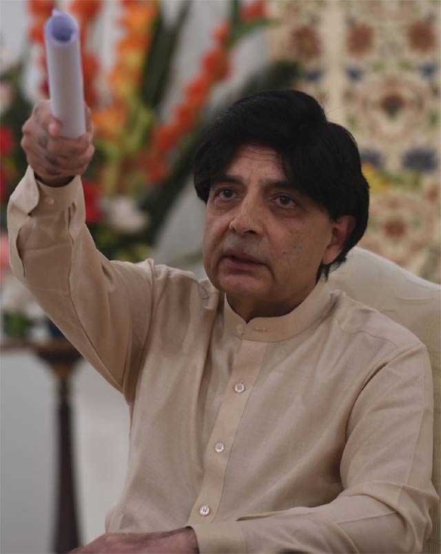Interior minister says there was no exchange of harsh words between ISI chief, Punjab CM. PHOTO: AFP