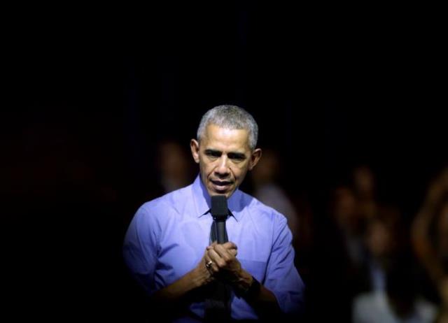 U.S. President Barack Obama addresses the audience at a town hall meeting with young leaders at the Pontifical Catholic University of Peru in Lima November 19, 2016. PHOTO: REUTERS