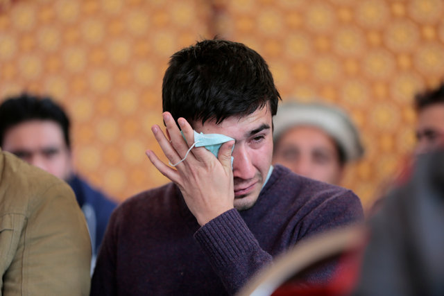 Relatives grieve as they wait for word on the collection of the remains of victims of the Pakistan International Airlines (PIA) plane crash at PIMS hospital in Islamabad. PHOTO: REUTERS