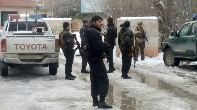 Afghan policemen keep watch at the site of a bomb blast in Kabul, Afghanistan February 7, 2017. PHOTO: REUTERS