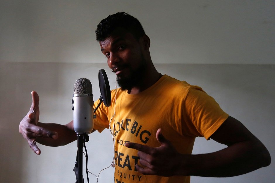 Lyari UnderGround (L.U.G) rapper, Slipknot Denna, poses for a camera during an interview with Reuters in Karachi. PHOTO: REUTERS