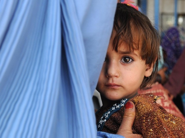 Police have painted AH followed by a serial number on 300 houses occupied by Afghan refugees. PHOTO: AFP