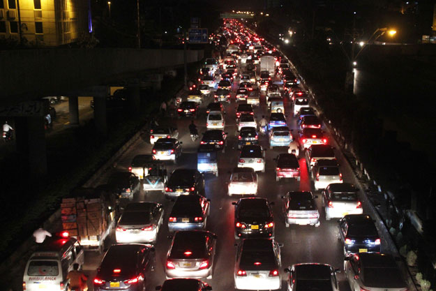 Traffic gridlock on Shahrah-e-Faisal, Karachi. PHOTO: EXPRESS