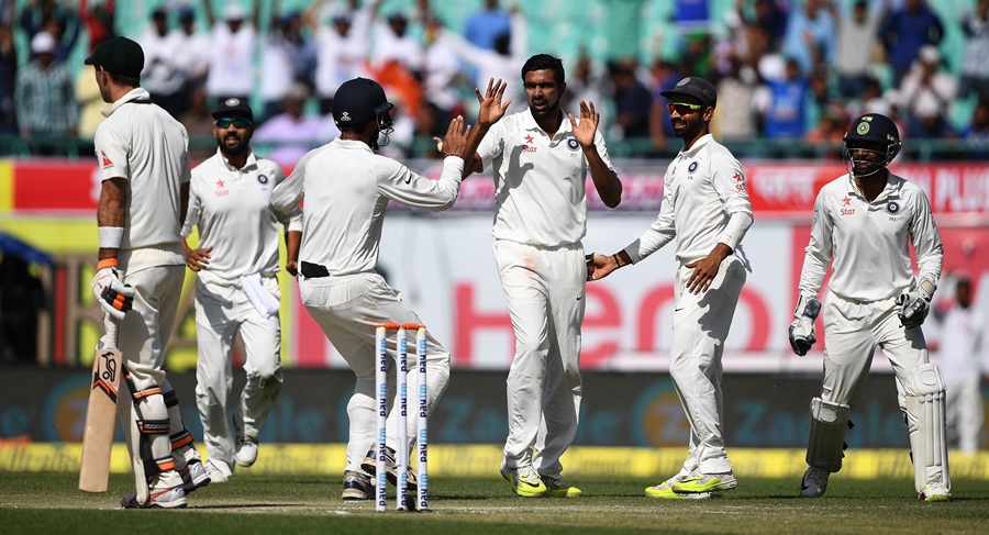 India's Ravichandran Ashwin (C) celebrates with teammates after taking the wicket of Australia's Glenn Maxwell (L) during the third day of the fourth and last Test cricket match between India and Australia at The Himachal Pradesh Cricket Association Stadium in Dharamsala on March 27, 2017.
PHOTO: AFP
