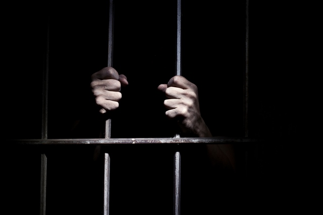 Man in prison. PHOTO: REUTERS