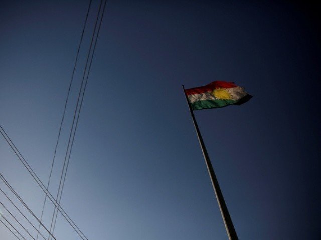 A Kurdish flag flutters atop the Citadel of Erbil, northern Iraq June 8, 2017. PHOTO: REUTERS