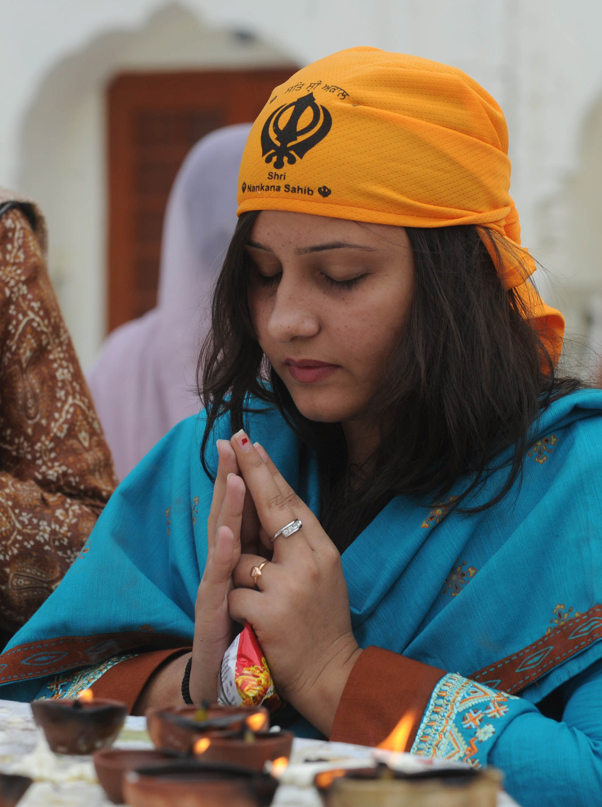 In this file photo, a Sikh devotee from India prays during the 542nd birth anniversary of Guru Nanak Dev at Nankana Sahib. PHOTO: AFP
