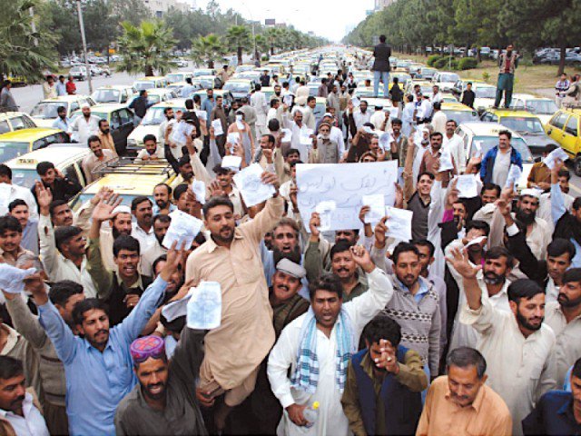 In a file photo taxi drivers hold a protest rally in Islamabad. PHOTO: INP