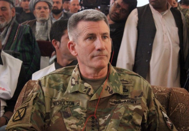 The commander of US and NATO forces in Afghanistan General John W. Nicholson sits during his visits from Kunduz province, Afghanistan. PHOTO: REUTERS