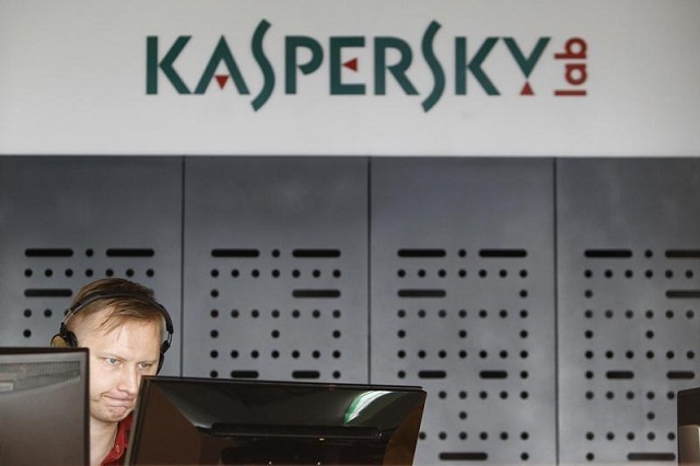 An employee works near screens in the virus lab at the headquarters of Russian cyber security company Kaspersky Labs in Moscow July 29, 2013. PHOTO: REUTERS