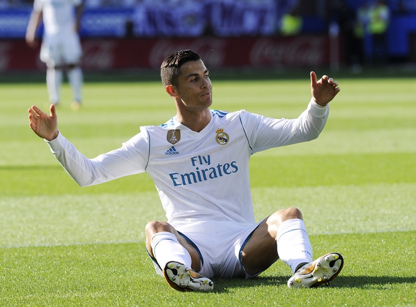 Mixed form: Ronaldo is yet to get off the mark in La Liga but did score twice in the first Champions League group game. PHOTO: AFP