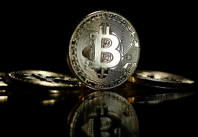 Bitcoins are seen in this illustration picture taken September 27, 2017. PHOTO: REUTERS