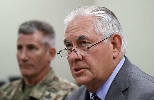 US Secretary of State Rex Tillerson speaks next to General John Nicholson (L) at Bagram Air Field in Afghanistan on October 23, 2017. PHOTO: AFP