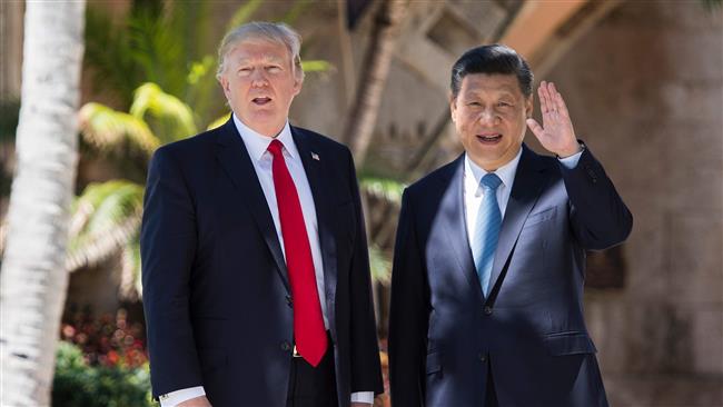 Chinese President Xi Jinping (R) and US President Donald Trump,PHOTO:AFP