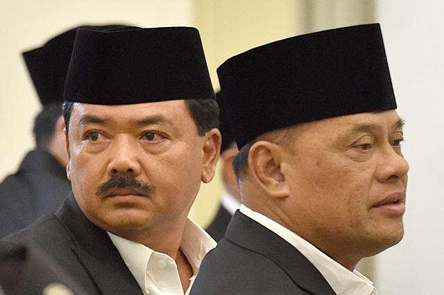 Chief of Indonesia Air Forces Hadi Tjahjanto (L) stands beside the head of Indonesia Armed Forces General Gatot Nurmantyo during commemoration day of the birth of Prophet Muhammad, in Bogor, Indonesia November 30, 2017
PHOTO: REUTERS