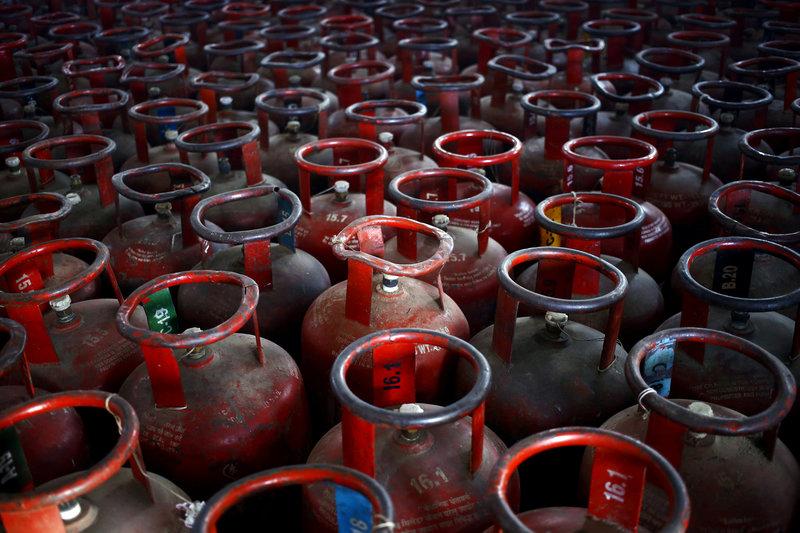 Empty Liquefied Petroleum Gas (LPG) cylinders are seen at a gas distribution centre. PHOTO: REUTERS
