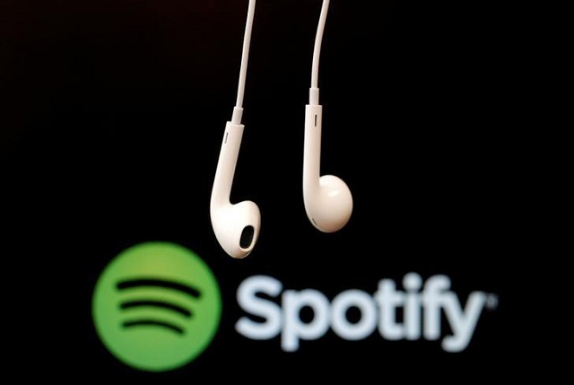 Headphones are seen in front of a logo of online music streaming service Spotify in this February 18, 2014 illustration picture.
PHOTO: REUTERS