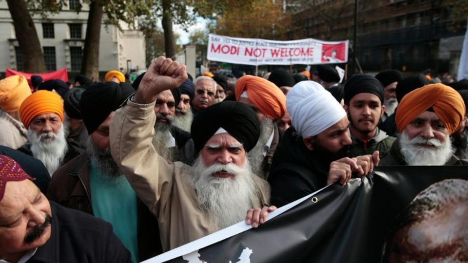 British Sikhs protesting against the visit of Prime Minister Narendra Modi outside Downing Street in London. PHOTO: REUTERS