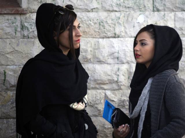 Under Iran's law, women are obliged to cover their hair with a scarf, known as a Hijab, and wear loose-fitting clothes. PHOTO: REUTERS