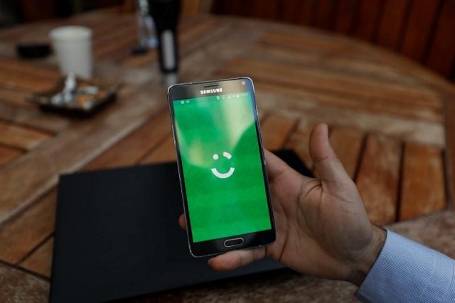 An employee shows the logo of ride-hailing company Careem on his mobile in his office in the West Bank city of Ramallah July 17, 2017. Picture taken July 17, 2017.
PHOTO: REUTERS