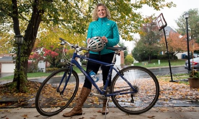 Juli Briskman with her bicycle. PHOTO: GUARDIAN
