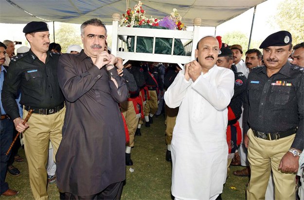 Home Minister Sohail Anwar Siyal and IG AD Khowaja attend last rites of martyred head constable Hidayatullah Niazi. PHOTO: PPI