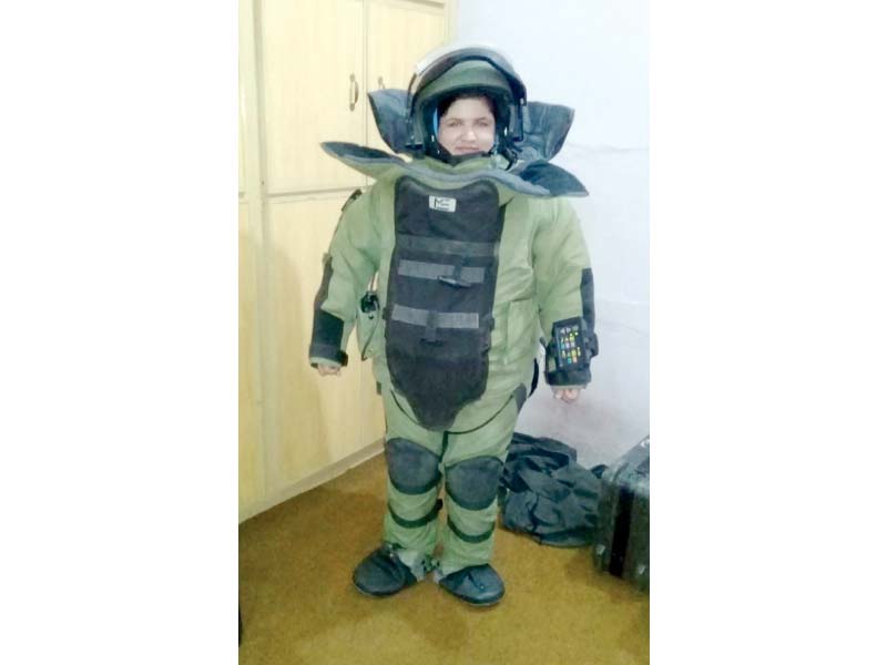 Constable Atia Batool in bomb disposal suit. PHOTO: EXPRESS