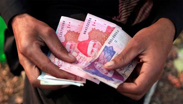 Govt will ask NEPRA to add 55 paisa per unit to consumer tariff to cover the cost of debt. PHOTO: REUTERS