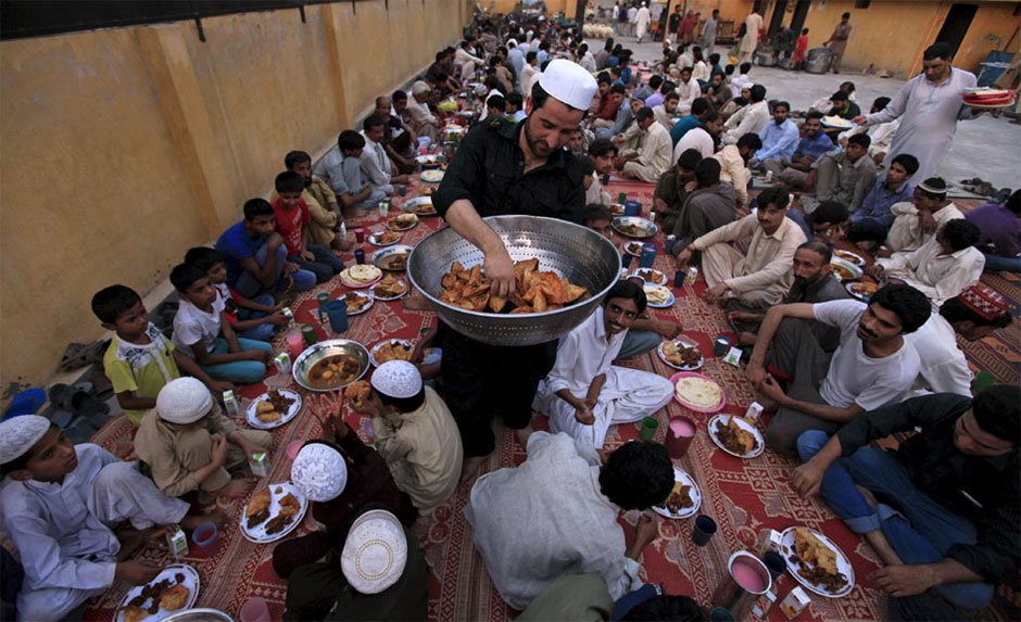 People break their fast in Ramazan. PHOTO: REUTERS