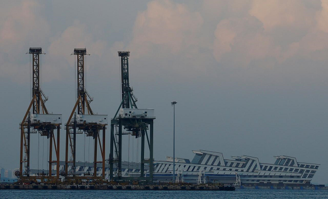 Container cranes are pictured at the Port of Singapore. PHOTO: REUTERS