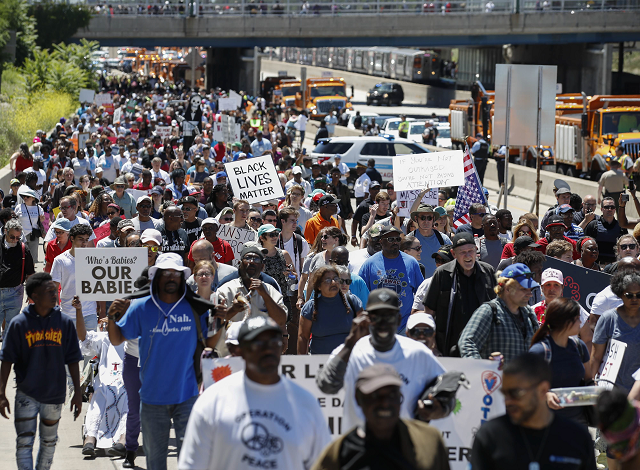 Protesters partially shut down a Chicago Expressway to protest gun violence. PHOTO: AFP.