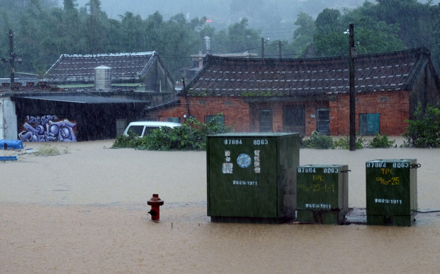 Taiwan hit by floods after torrential rains. PHOTO: AFP