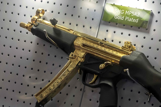 1. A gold plated weapon is displayed at the Pakistani stand during Egypt s first Service Defence Exhibition in Cairo on December 3, 2018, at the International Exhibition Center
PHOTO: AFP