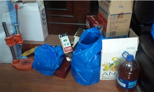 Large quantity of liquor, beer and equipment recovered in police operation. PHOTO: ISLAMABAD POLICE