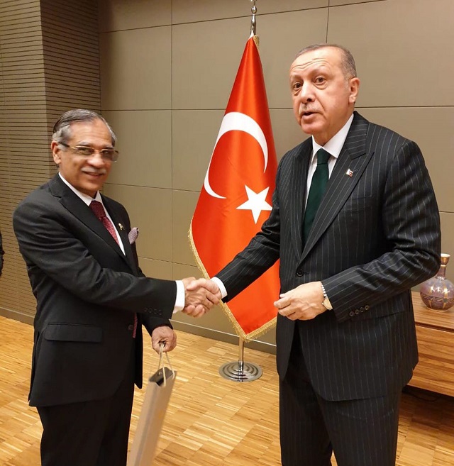 Chief Justice Mian Saqib Nasir shaking hands with Turkish President Tayyib Erdogan in Konya on December 18, 2019. PHOTO: APP