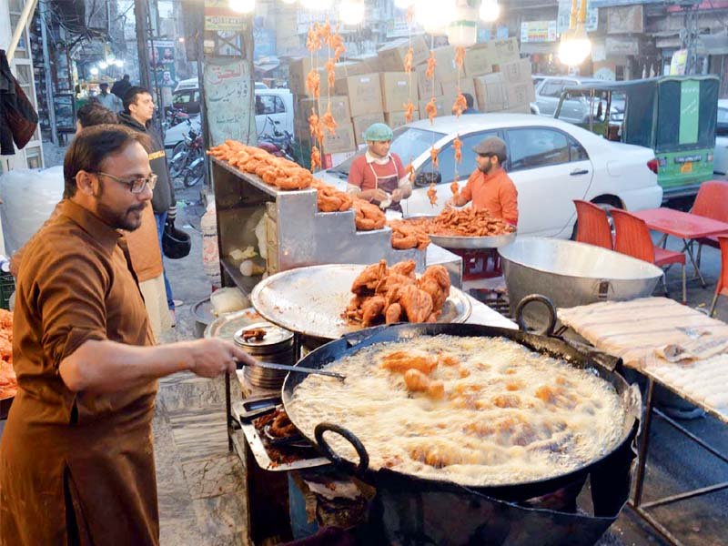With the onset of winter the demand and sale for fish increases but not much attention is paid to hygienic conditions. PHOTO: AGENCIES