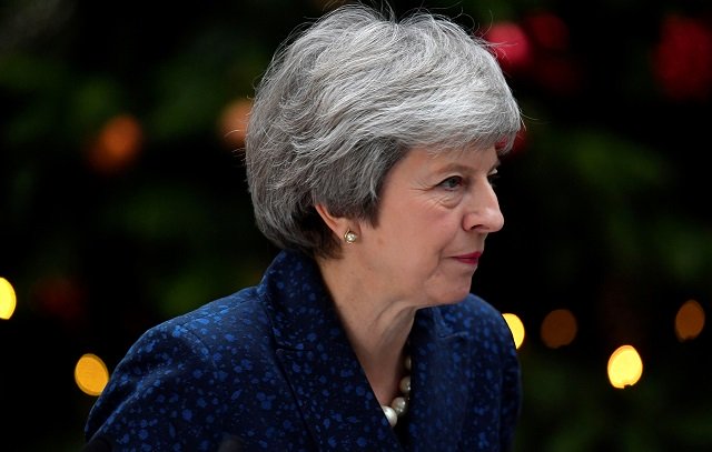 Britain's Prime Minister Theresa May addresses the media outside 10 Downing Street after it was announced that the Conservative Party will hold a vote of no confidence in her leadership, in London, Britain, December 12, 2018. PHOTO:REUTERS