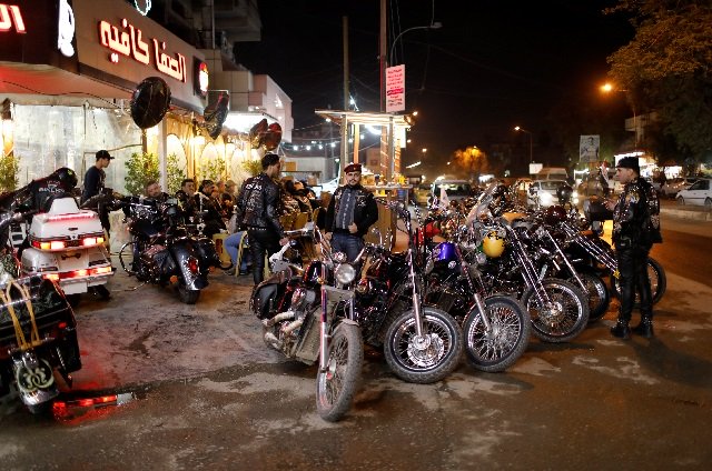 Members of the Iraq Bikers, the first Iraqi biker group, gather outside a cafe in Baghdad, Iraq. PHOTO: REUTERS