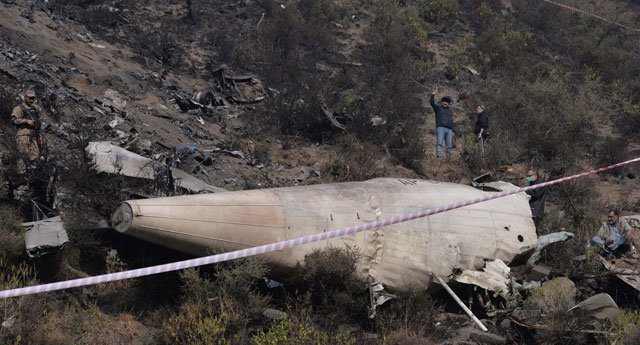 En route to Islamabad, PIA flight PK-661 from Chitral crashed in the hills of Gagan near Havelian city. PHOTO: AFP