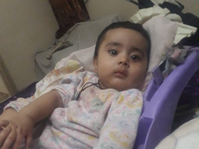 Toddler falls prey to police crossfire in Karachi. PHOTO: EXPRESS