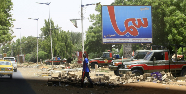 Fewer people than usual were on the streets of Khartoum, patrolled by heavily armed paramilitaries. PHOTO: AFP