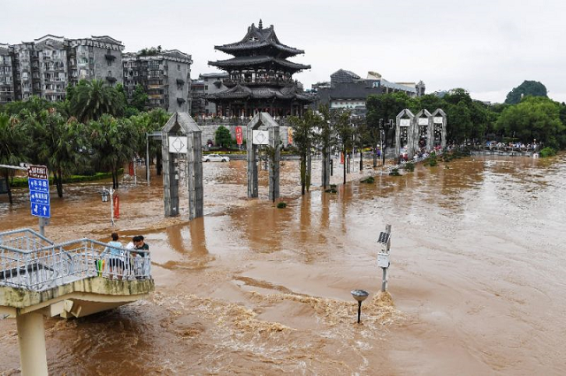 Streets in Guilin are submerged by floodwater on June 9, 2019 in China's southern Guangxi region after heavy rains. PHOTO: AFP