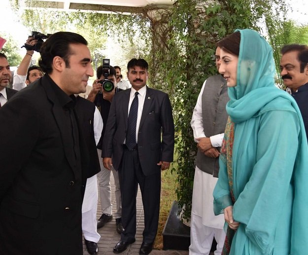 PML-N Vice President Maryam Nawaz Sharif greets PPP Chairman Bilawal Bhutto Zardari on his arrival at Jati Umra on Sunday. PHOTO: EXPRESS