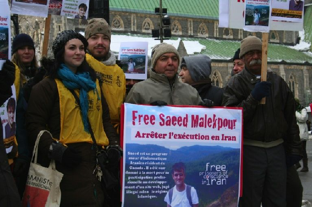 This photo shows supporters demonstrating for the release of Saeed Malekpour in Montreal, Canada. PHOTO: AFP